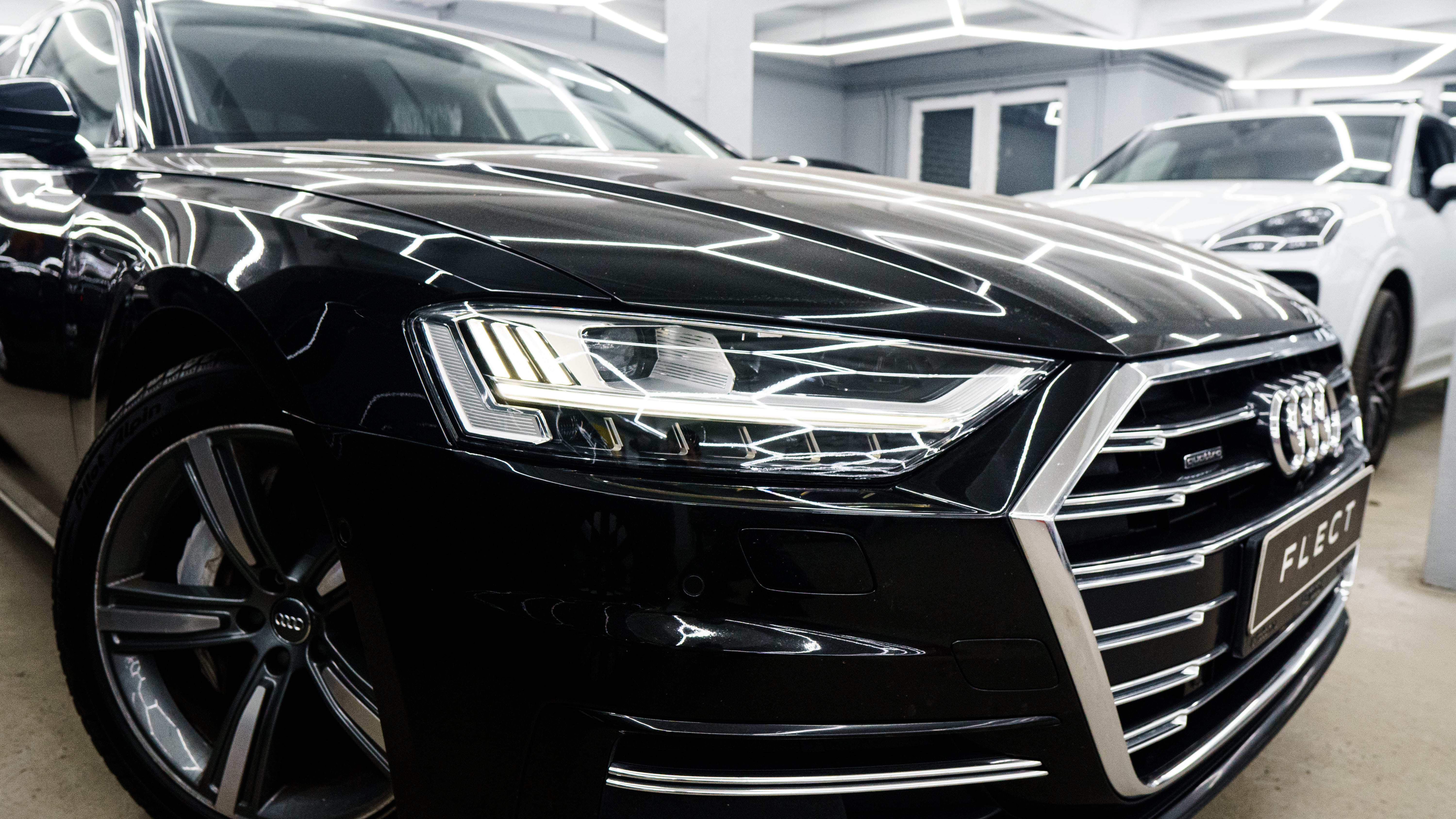 Замена стекла, оклейка фар пленкой AUDI A8