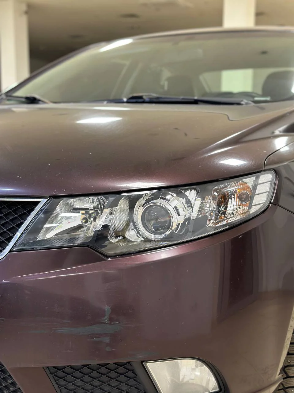 Улучшение света Kia Cerato 2: установка лазерных модулей и защита фар Улучшение света Kia Cerato 2: установка лазерных модулей и защита фар