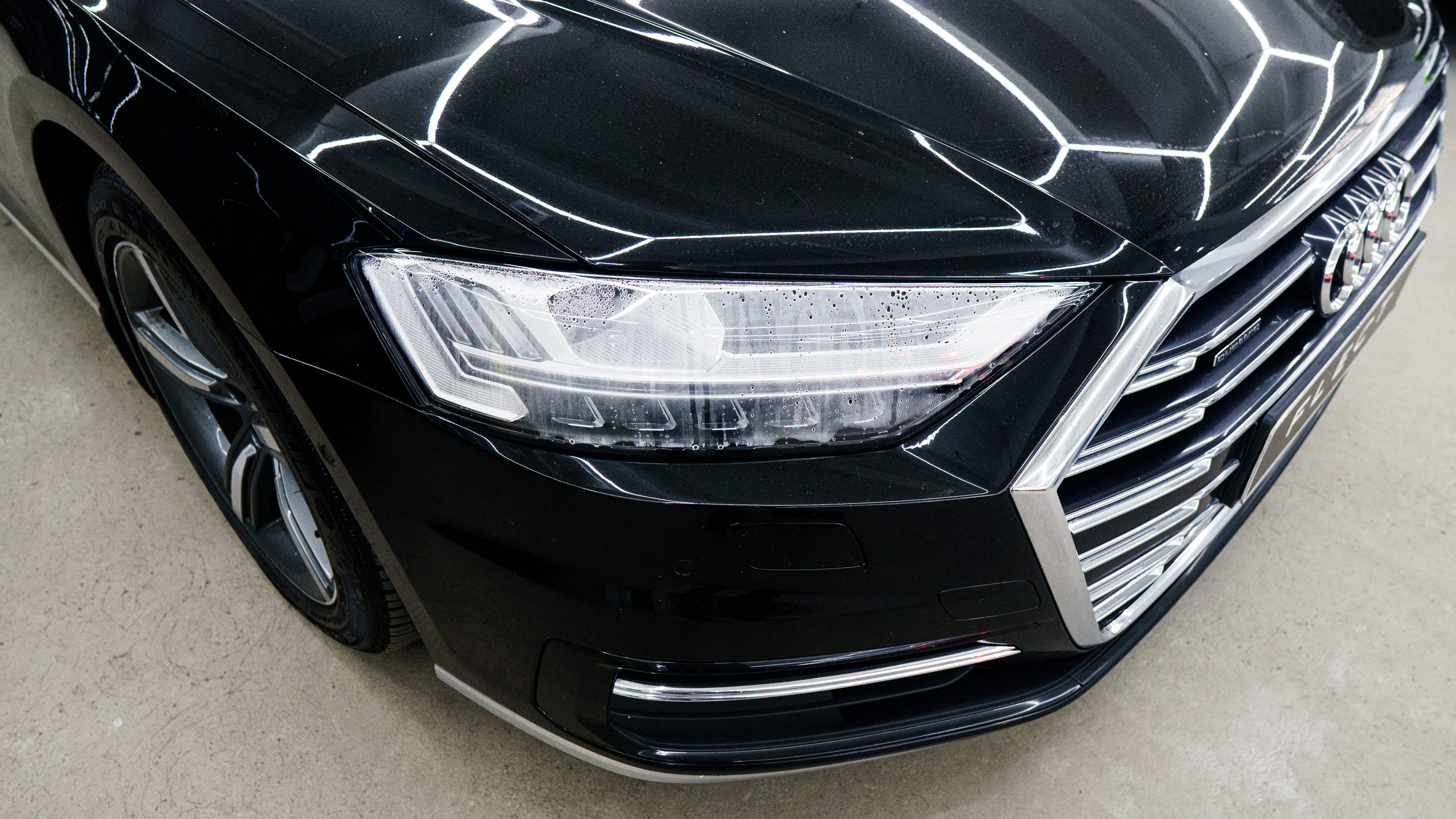 Замена стекла, оклейка фар пленкой AUDI A8